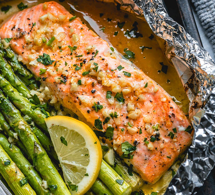 Baked Salmon and asparagus with lemon garlic butter sauce 