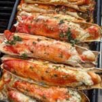 Grilled crab legs with garlic butter sauce